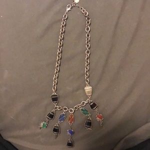 Necklace with Charms that fall at your décolletage